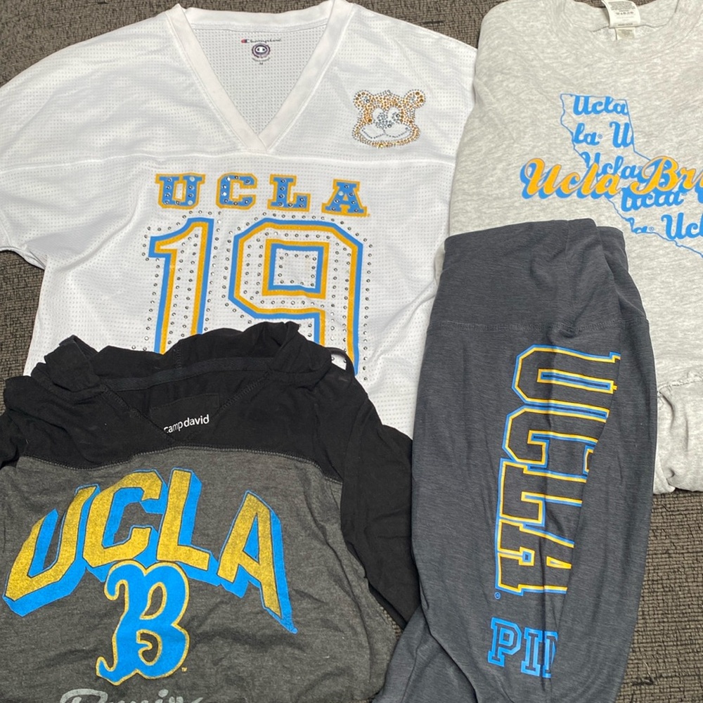UCLA apparel:1 women’s jersey,1 sweatshirt,1 hooded shirt,1 pair leggings